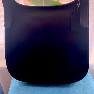 Vintage Coach Saddle black handbag .